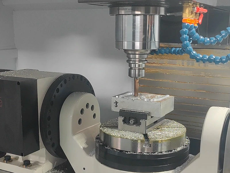 CNC machining for automotive industry showing machining center processing automotive parts
