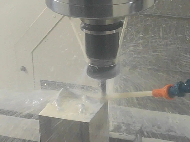 CNC machining for medical industry showing machining center processing titanium medical components