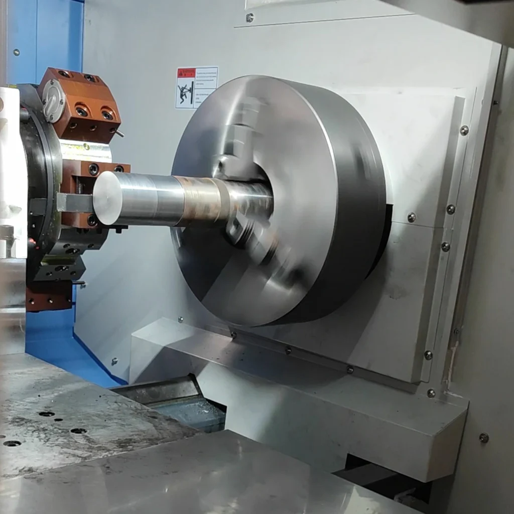 Flat bed CNC lathe turning outer diameter of metal cylindrical part