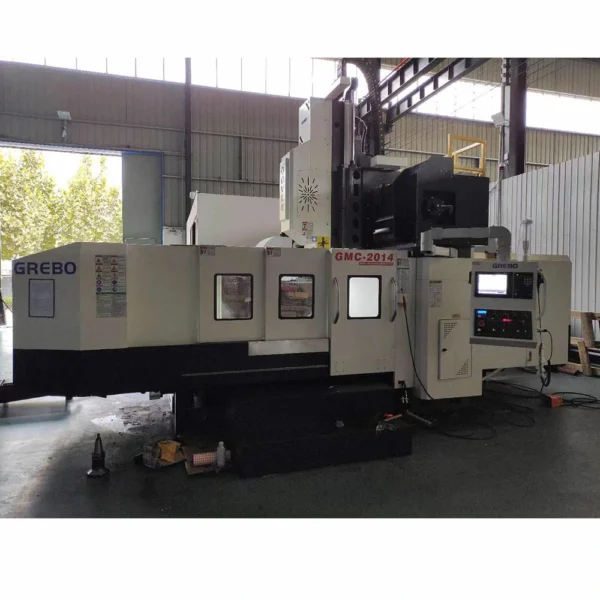 Gantry machining center on factory floor showing precision manufacturing and assembly environment