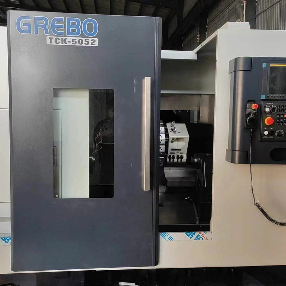 TCK5052 slant bed CNC lathe showing hydraulic chuck turret HIWIN guideways for precision shaft turning